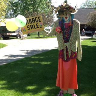 lady yard sale sign